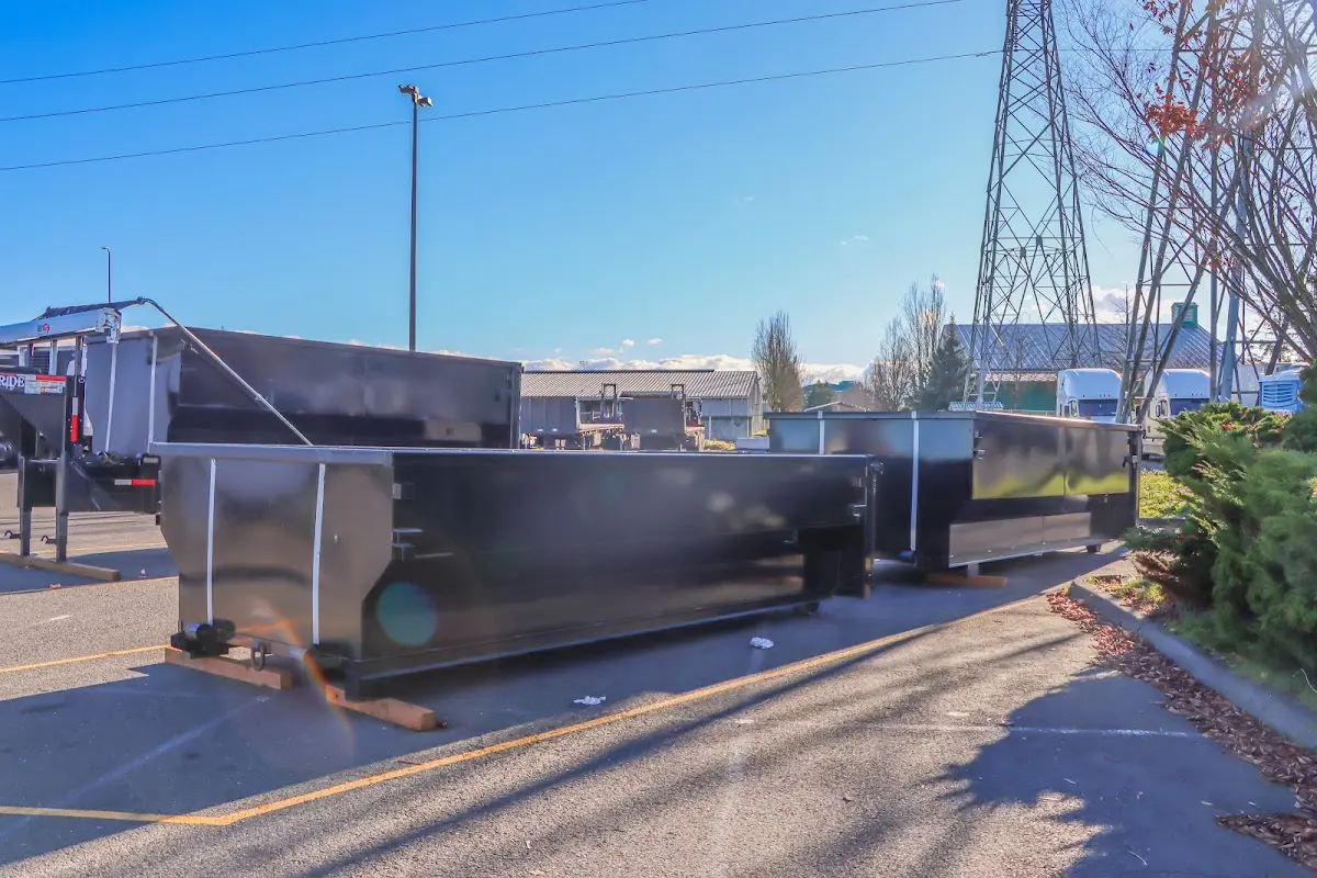 Roll-off dumpster ready for waste disposal at job site for Concrete Dumpster Rental in Elmsford